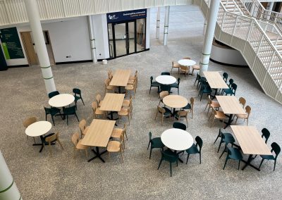 Round tables with four chairs and rectangular tables with four chairs